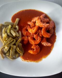Sun dried shrimp on ancho Guajillo sauce and nopales