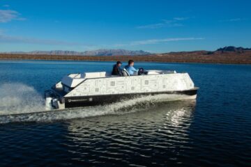electric pontoon boat on the water
