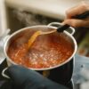 stirring creole barbecue sauce