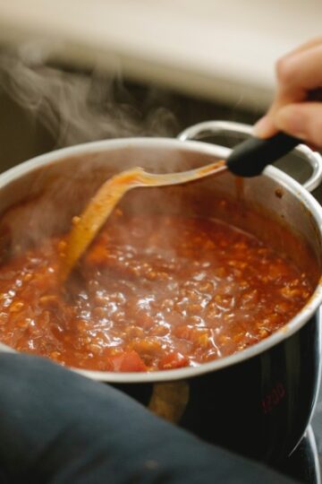 stirring creole barbecue sauce